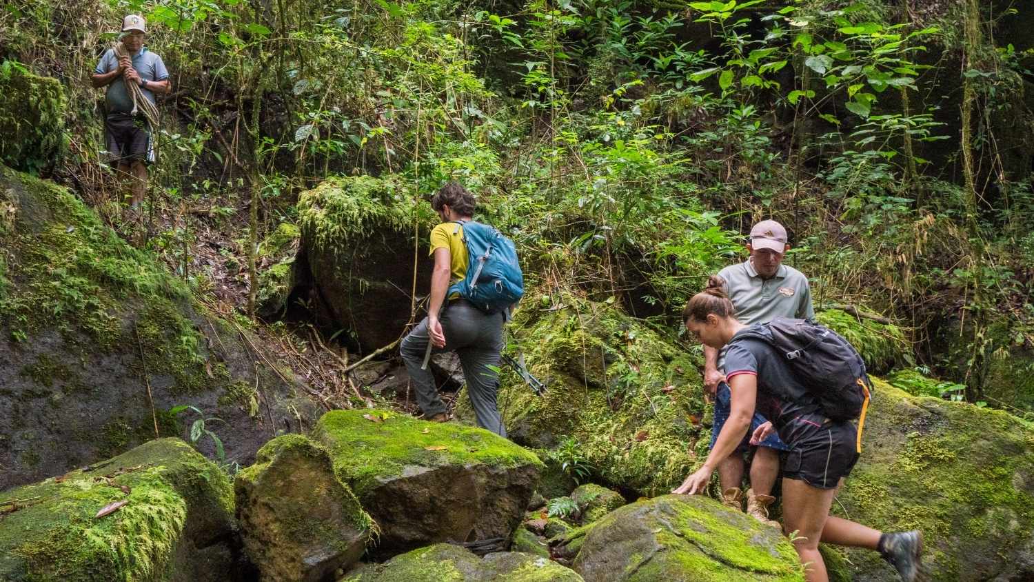 Group hiking over rocky terrain